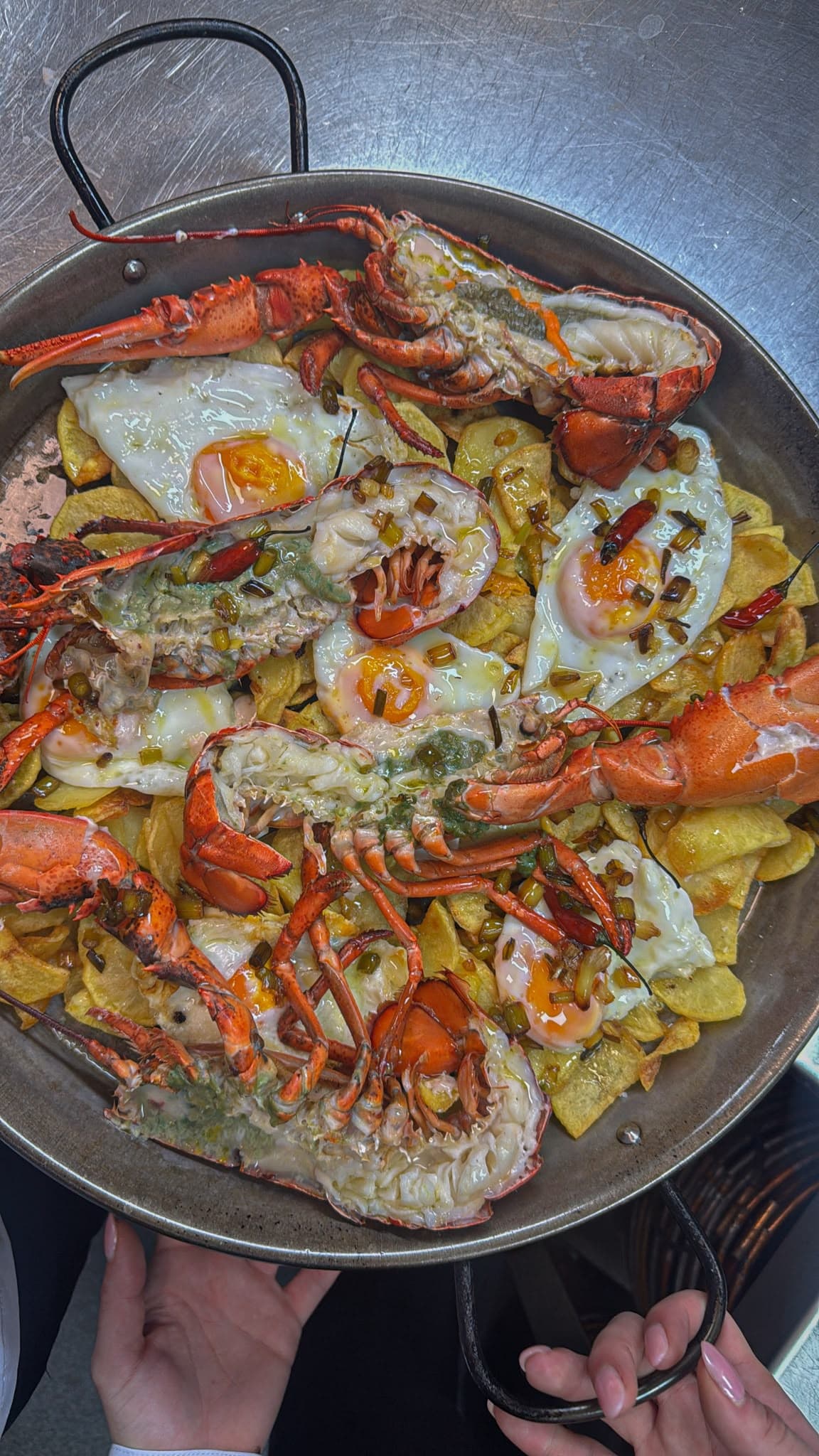Arroz de bogavante con huevos camperos